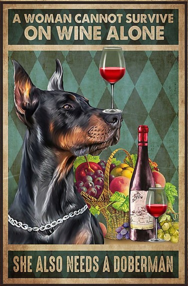 A woman cannot survive on wine alone she also needs a doberman poster