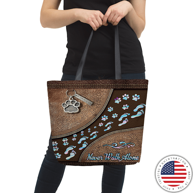 Dog paw never walk alone tote bag